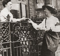 Postwomen delivering letters during World War One.