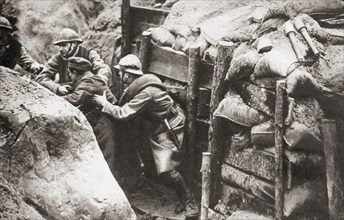 French troops making a daylight raid on German trenches in search of prisoners for information purposes.