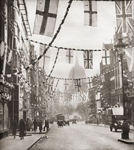 Flags and bunting hanging in Fleet Street.