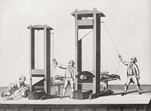 Two guillotines from the time of the French Revolution.