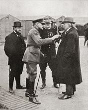 M. Albert Thomas, French Minister of Munitions, Sir Douglas Haig and General Joffre in conversation with Mr. Lloyd George.