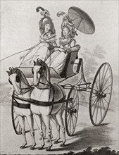 Two eighteenth century ladies in a carriage.
