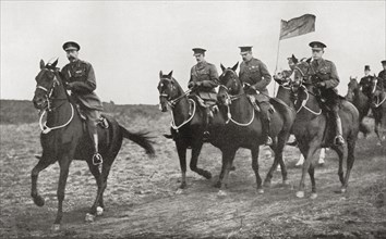 King George V and Lord Kitchener arriving at the parade ground near Aldershot for an inspection of Irish Soldiers.