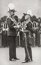 Lord Kitchener, with Lord Roberts.