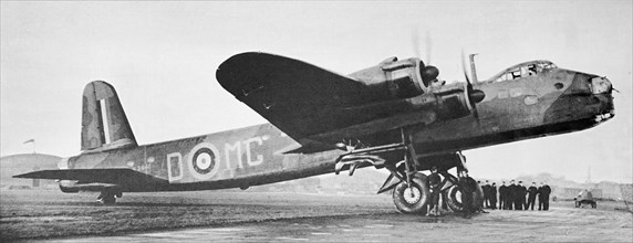 Short Stirling bomber side view on runway.
