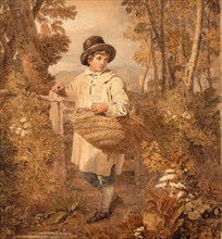 Jeune garçon ramassant du bois