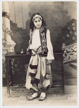 Young girl dressed for Christmas pantomime [? at Lahore]