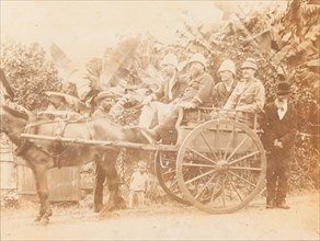 European men seated in horse drawn cart, Mauritius