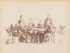 Group of women playing Fan-Tan