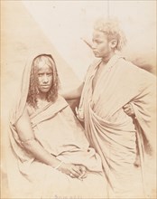 Portrait of two Bicharin people