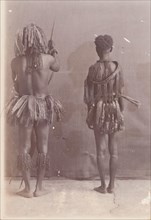 Portrait of Great Andamanese man and woman from behind