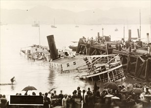 River steamer capsized by a typhoon