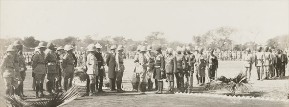 British military personnel greeting Sikh soldiers