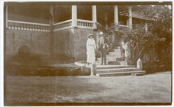Two Europeans on steps of house, Gikiyanakanda plantation