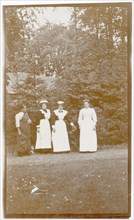 Four women in garden, Gikiyanakanda plantation