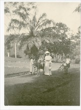 Group with children in garden, Gikiyanakanda plantation