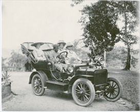 Europeans in car with Sinhalese driver