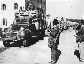 The first major food convoy, since the Haganah cleared the Jaerusalem – Tel Aviv road, arrives in Jerusalem