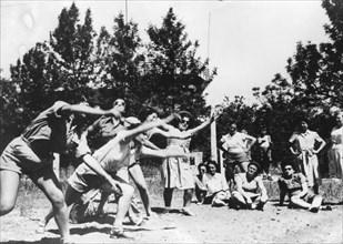 Jewish women practicing grenade throwing.