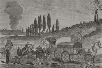 Franco-Prussian War (1870-1871). Burial of the dead by ambulances. Engraving. ""Historia de la