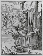 The trades. The dyer. Facsimile after a drawing and engraving by Jost Amman in the 16th century.