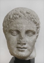 Head of Hermes. Probably a bigger part of a slab with face in high relief. 2nd century AD. From