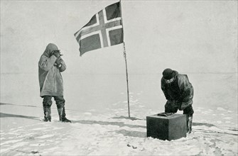 This photo shows Captain Roald Amundsen Taking Sights at the South Pole. The caption continues from