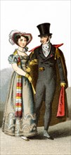 Pictured here are a German lady in 1818 and a gentleman in 1820. The illustration dates to 1882.