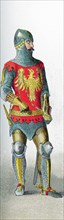 The figure represents a German knight between A.D. 1350 and 1400. The illustration dates to 1882.