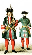 The figures represented here are two French guardsmen under Louis XV from 1700 to 1750 A.D. The