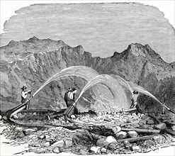 This 1896 illustration shows hydraulic mining being used by gold miners in the far West of the