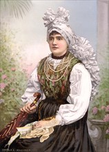 Girl in local costume.