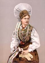 Girl in local costume.