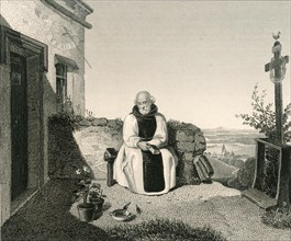 Relaxed monk in the garden, sitting on a bench and watching the birds at a small watering trough in