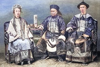 War mandarin and civilian mandarin next to a mandarin woman in imperial China.