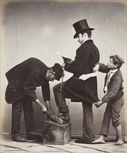 Pickpocket at work, While a shoeshine boy distracts the victim, a boy steals the wallet, 1850,