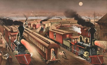 Night scene at an American railway junction.