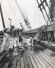 Swabbing The Schooner Decks