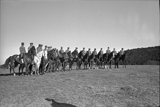 Willow near Chevenez. Cavalrymen riding their horses