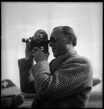 Prince Bernhard of the Netherlands holding a hand camera, Dvºbendorf 1946.