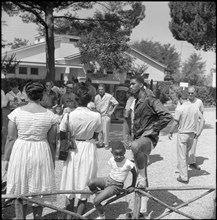 Rome 1960: world record holder John Thomas with his family.