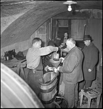 New Year's Eve wine is bottled in Zofingen in 1941.