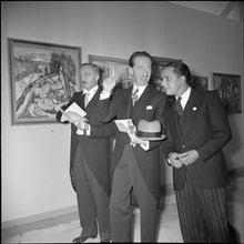 Enrico Celio (c) at an exhibition, 1941