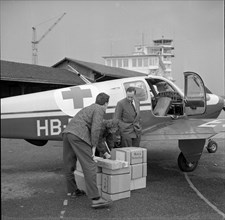 Swiss sports pilot with medicaments for Hungary, Kloten around 1956.