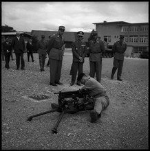 King Bhumibol of Thailand (c) visiting soldiers in Thun, 1960.