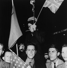 Young people celebrating end of second world war; 1945.