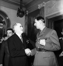 General Charles de Gaulle, right,  in Geneva, 1946.