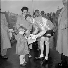 Rolf Graf, signing an autograph, TdS 1957.