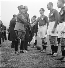 General Guisan greets the Swiss national soccer team, 1939.