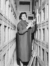 Woman in cooperative cold-storage room .